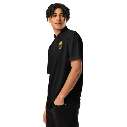 Person wearing a black polo shirt with a logo on a white background