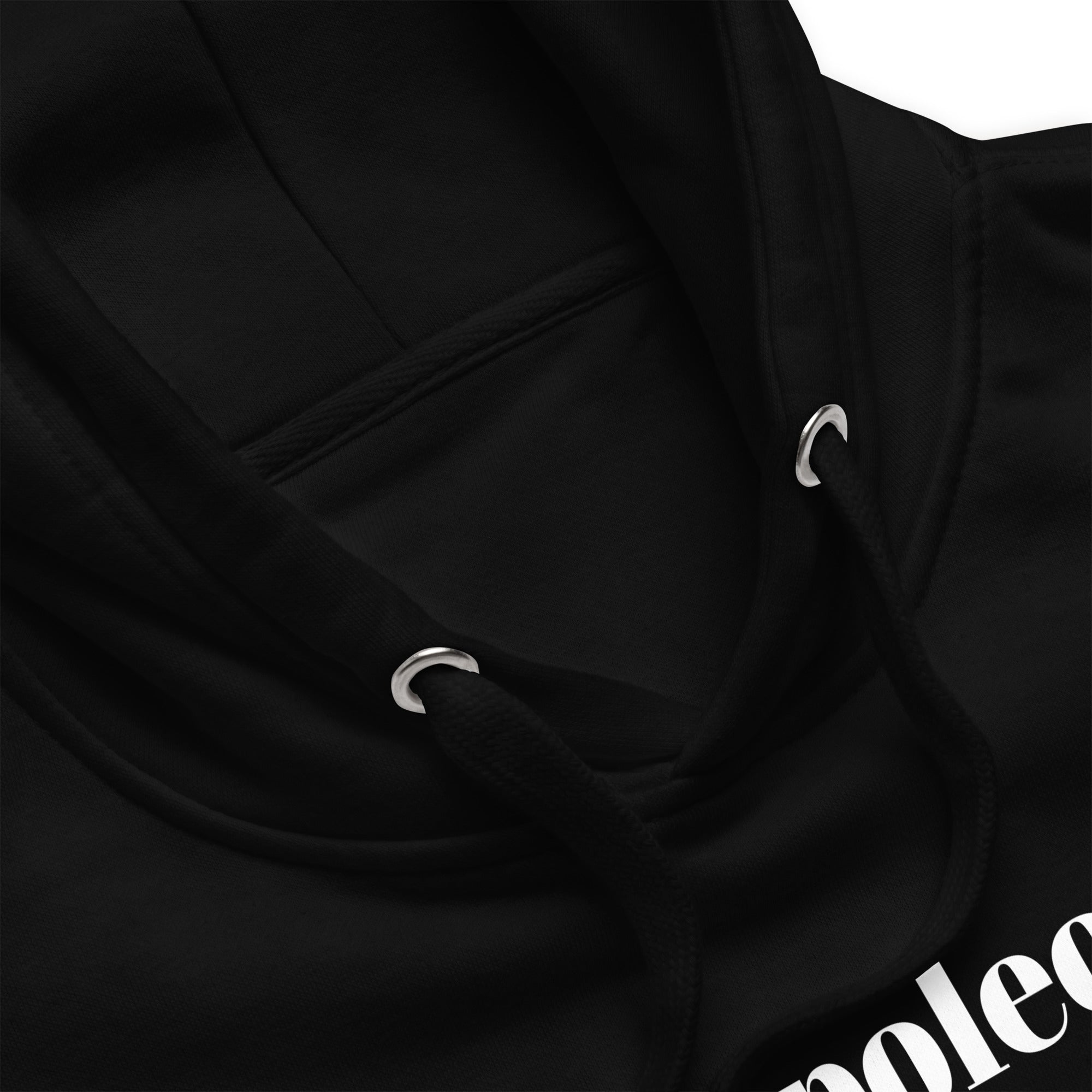 Close-up of a black hoodie with a brand logo on a white background as history souvenir
