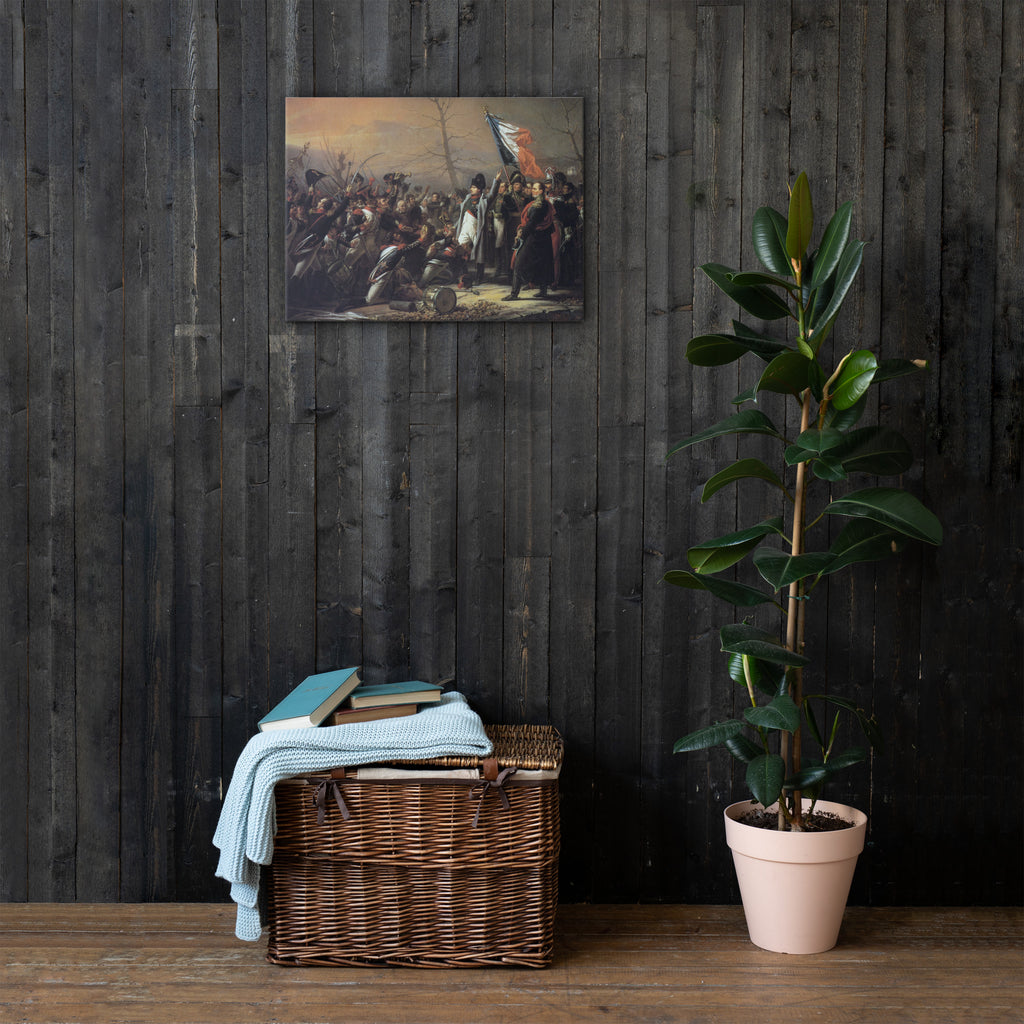 Wicker basket with folded clothes against a dark wooden wall with a painting and a potted plant.