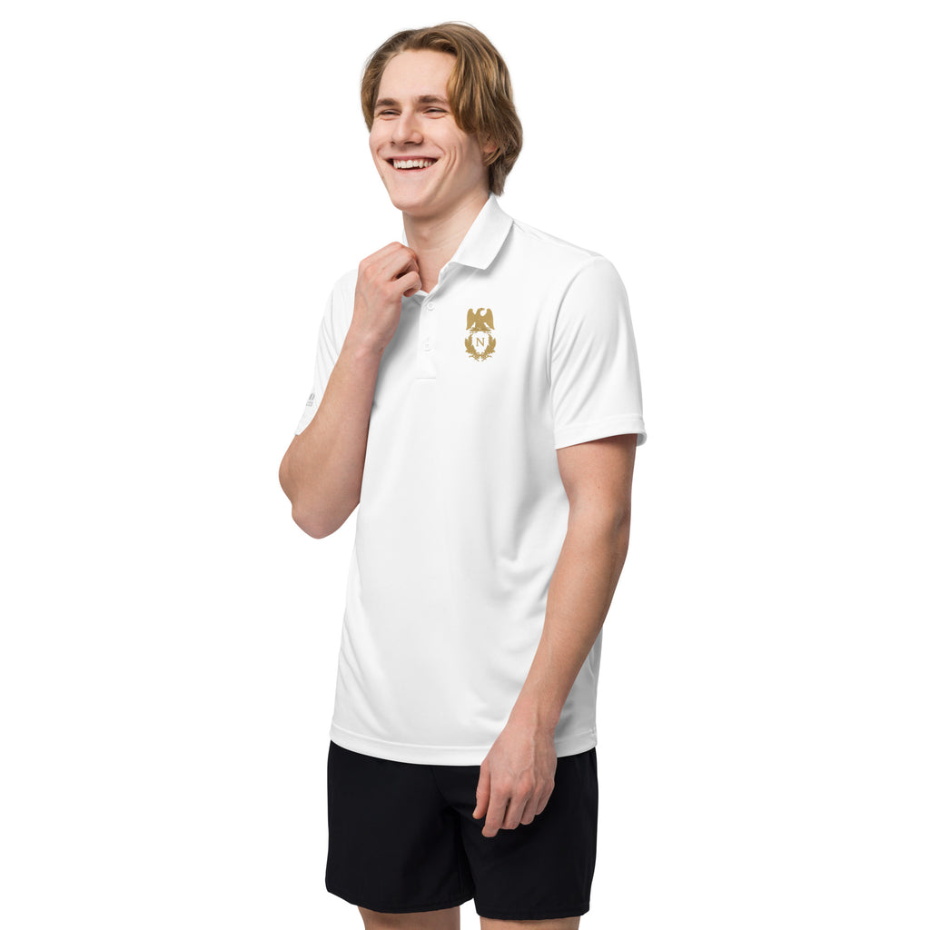 Person wearing a white polo shirt with a logo on a white background