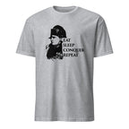 Gray t-shirt with a graphic of a person wearing a helmet and text 'Eat Sleep Conquer Repeat' on a white background.