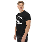 Man wearing a black t-shirt with 'KEEP THE FAITH' text on a white background